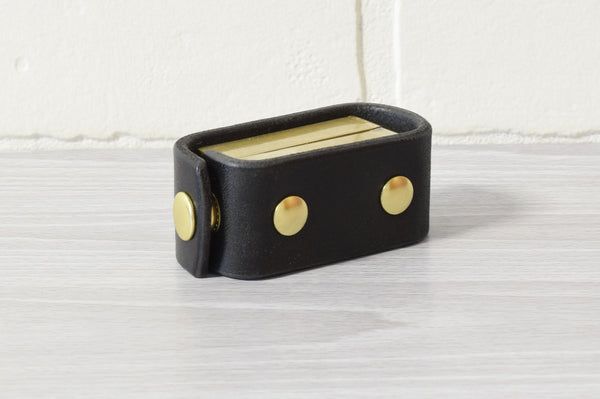 Nomad Book Weight –  Black/Brass