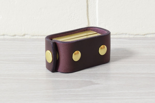 Nomad Book Weight –  Eggplant/Brass