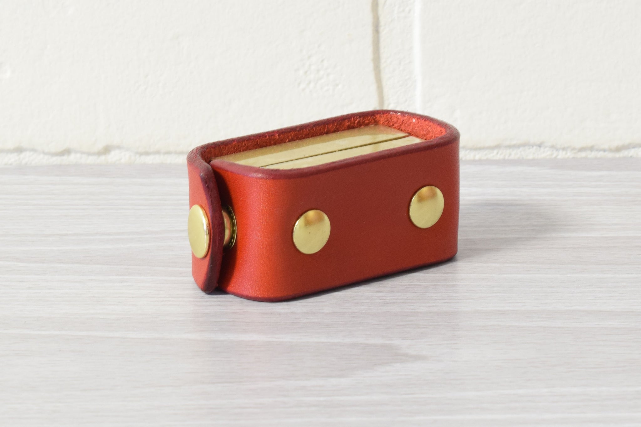 Nomad Book Weight –  Fire Engine Red/Brass