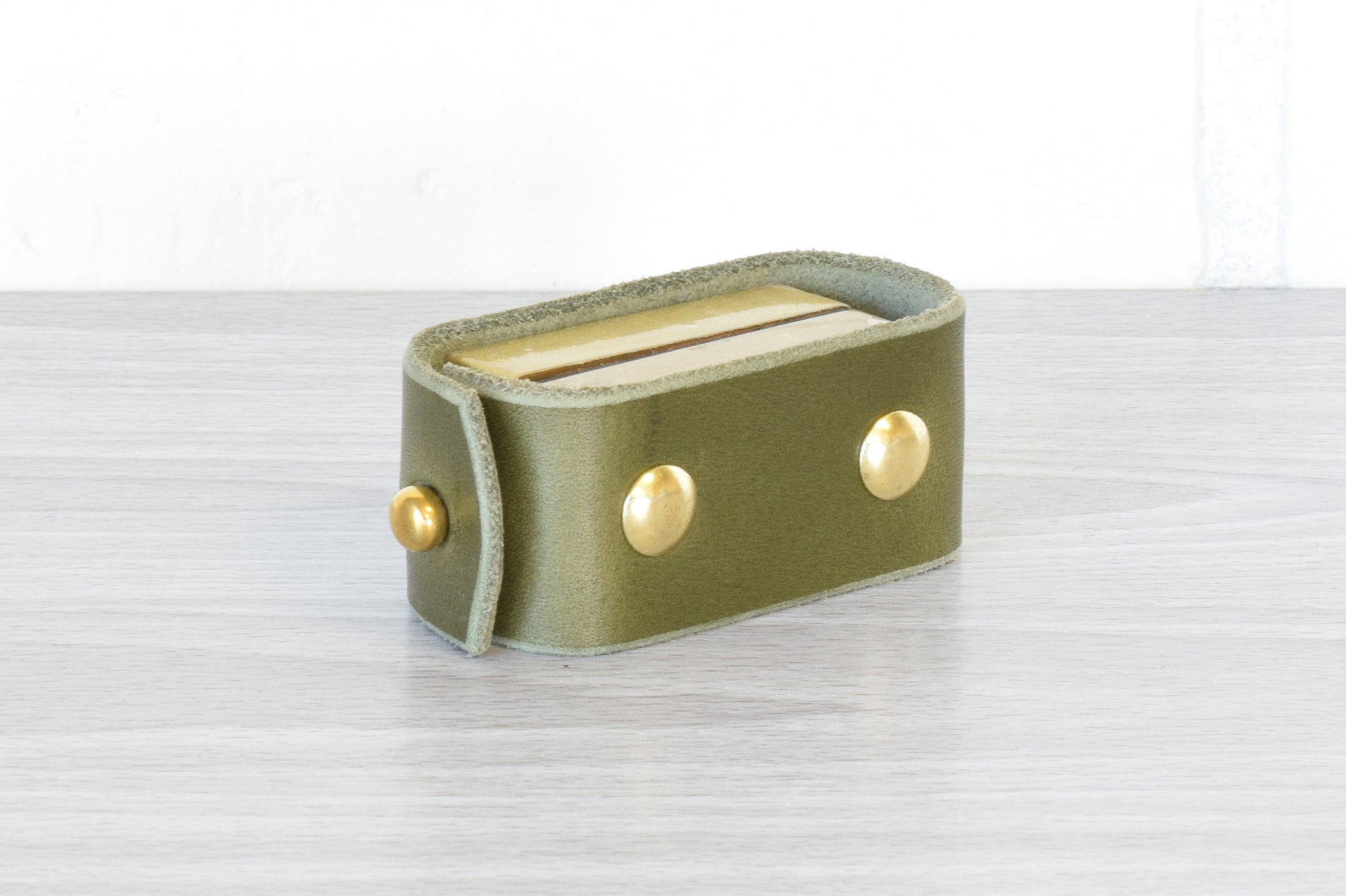 Nomad Book Weight –  Olive with Brass